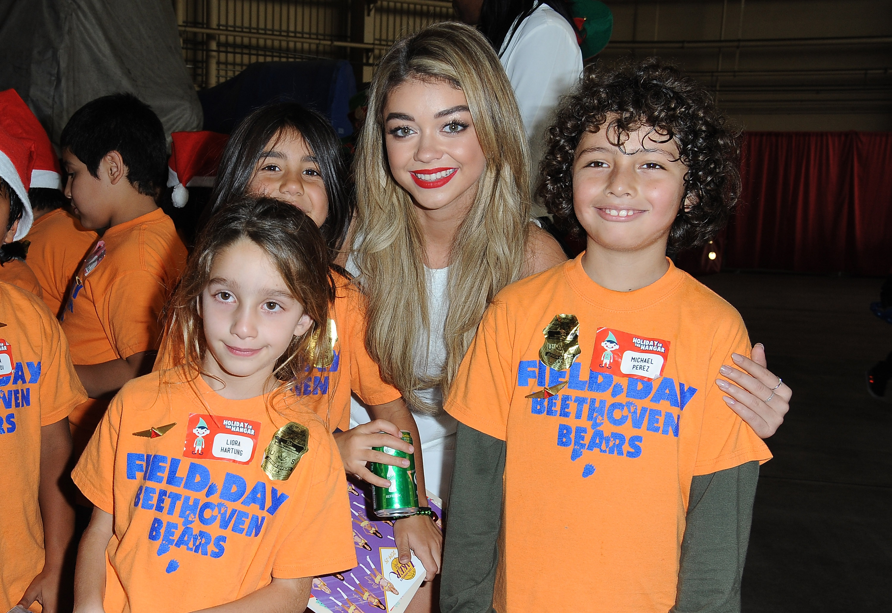 Sarah Hyland & Jordin Sparks Celebrate the Holidays at Delta Airlines’ “Holiday in the Hangar” at LAX
