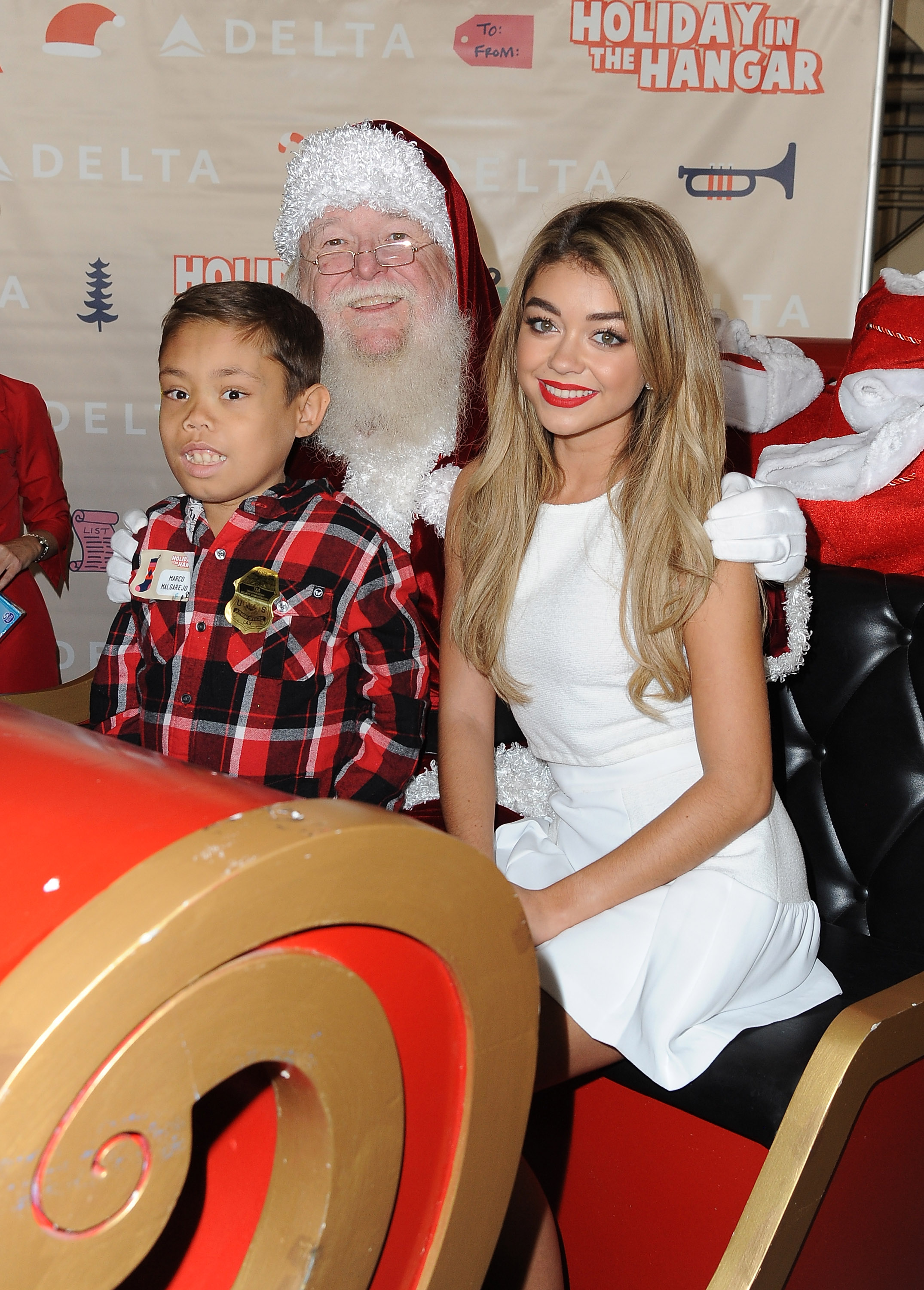 Sarah Hyland & Jordin Sparks Celebrate the Holidays at Delta Airlines’ “Holiday in the Hangar” at LAX
