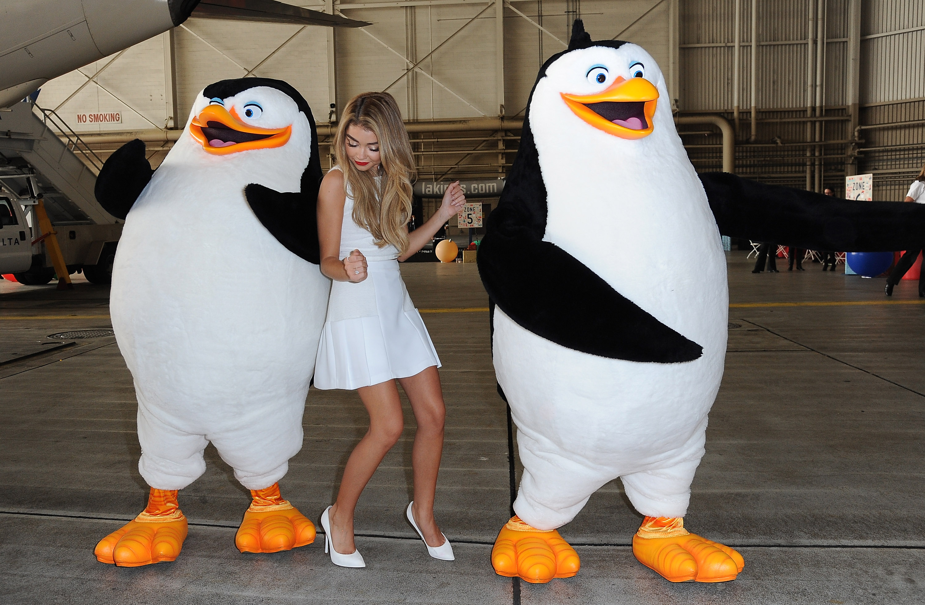Sarah Hyland & Jordin Sparks Celebrate the Holidays at Delta Airlines’ “Holiday in the Hangar” at LAX