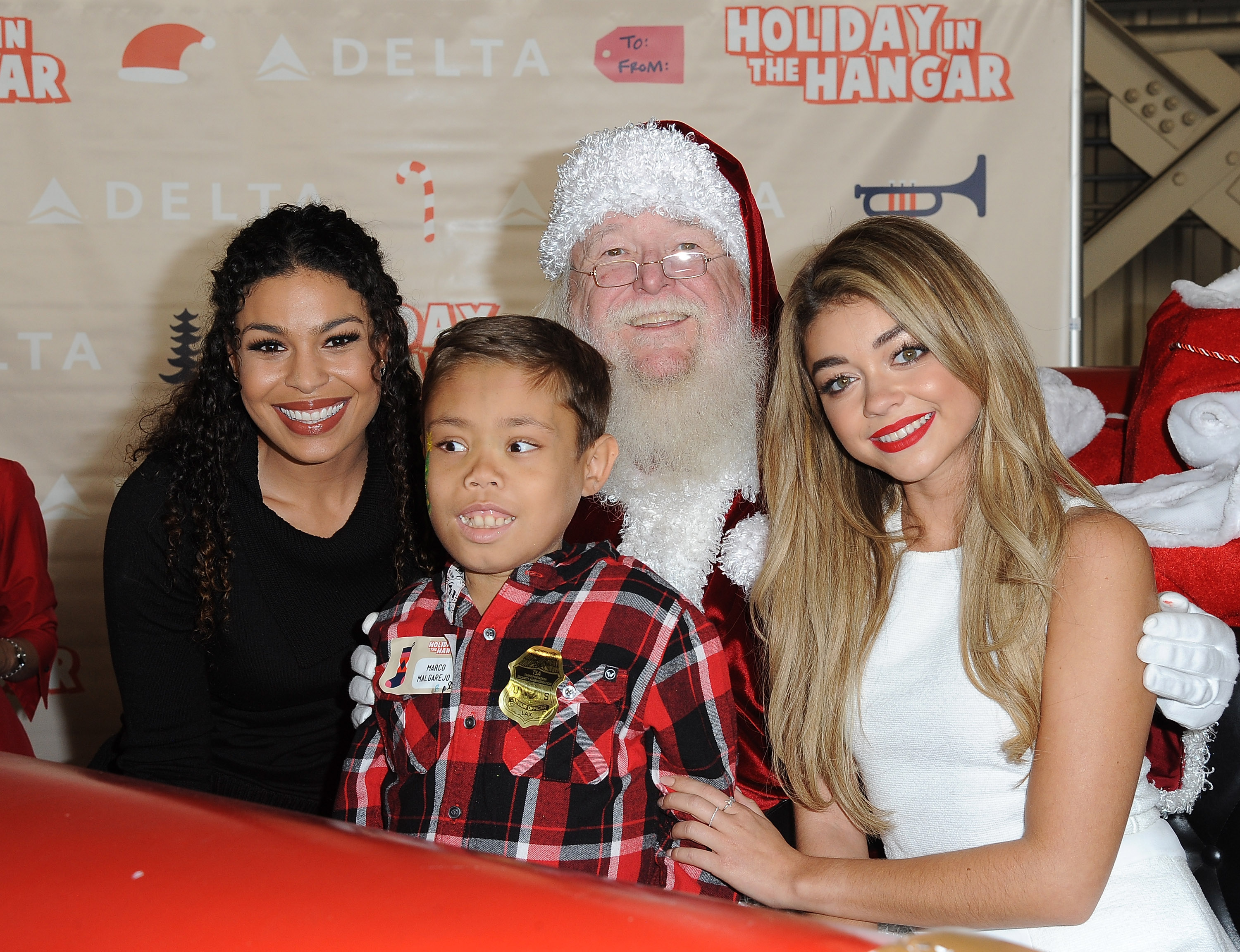 Sarah Hyland & Jordin Sparks Celebrate the Holidays at Delta Airlines’ “Holiday in the Hangar” at LAX