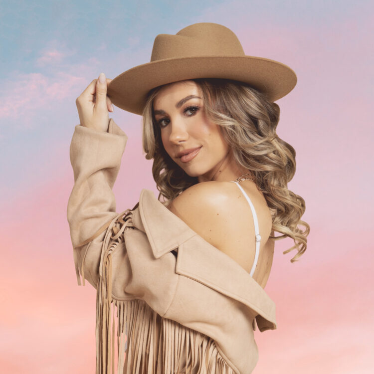 Genevieve Fisher Opens Up About Recording New Single “Now We’re Talking” While Six Months Pregnant (Exclusive)