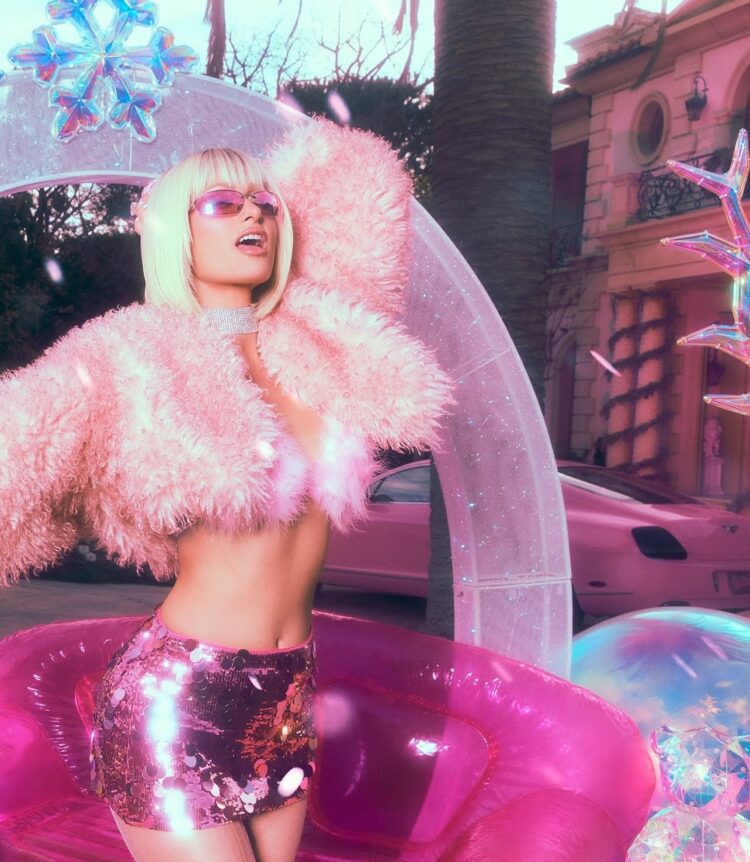 Paris Hilton Sparkles in Winter Wonderland Photo Shoot With Chic Faux Fur Coat and It-Girl Mini Skirt