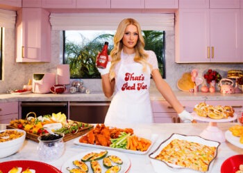 Paris Hilton Serves Up Spicy Game Day Glam in New Frank’s RedHot Super Bowl Ad