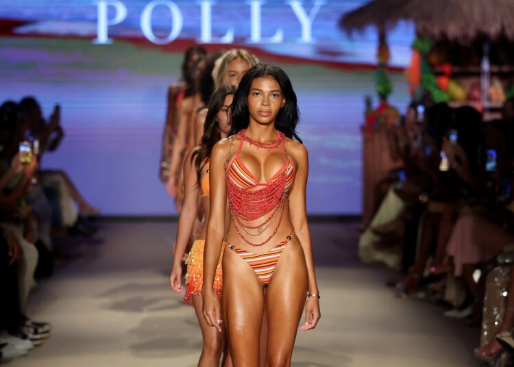 ‘Secret Lives of Mormon Wives’ Star Layla Taylor Owns the Runway at Oh Polly’s Show During Miami Swim Week