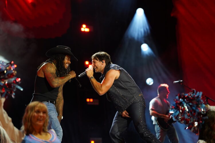 Russell Dickerson is Smashing Country Boundaries: Inside His Whirlwind Month From the AMAs to a History-Making CMA Fest